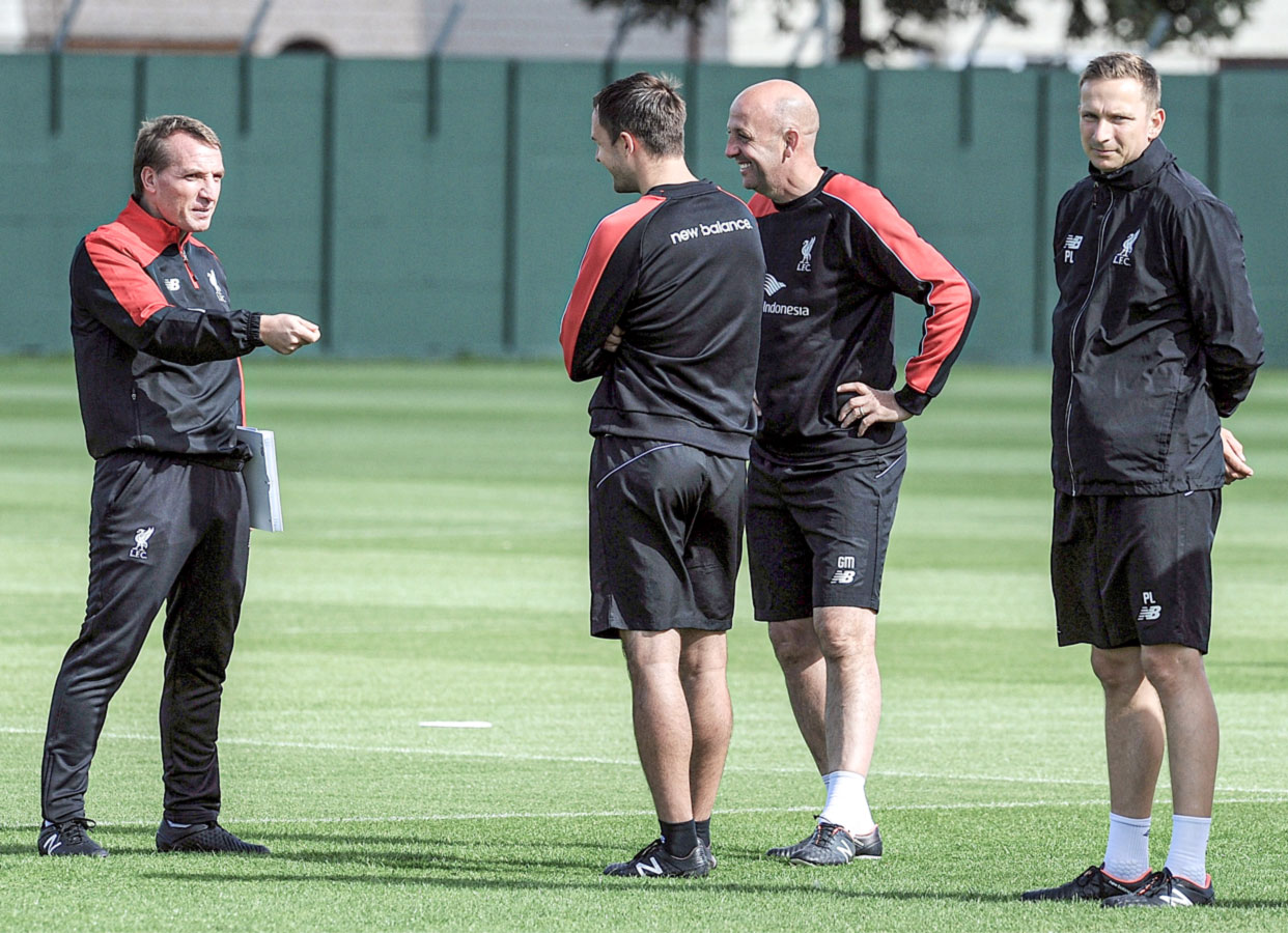 Pep Lijnders as part of the Liverpool first-team staff with Brendan Rodgers and Gary McAllister